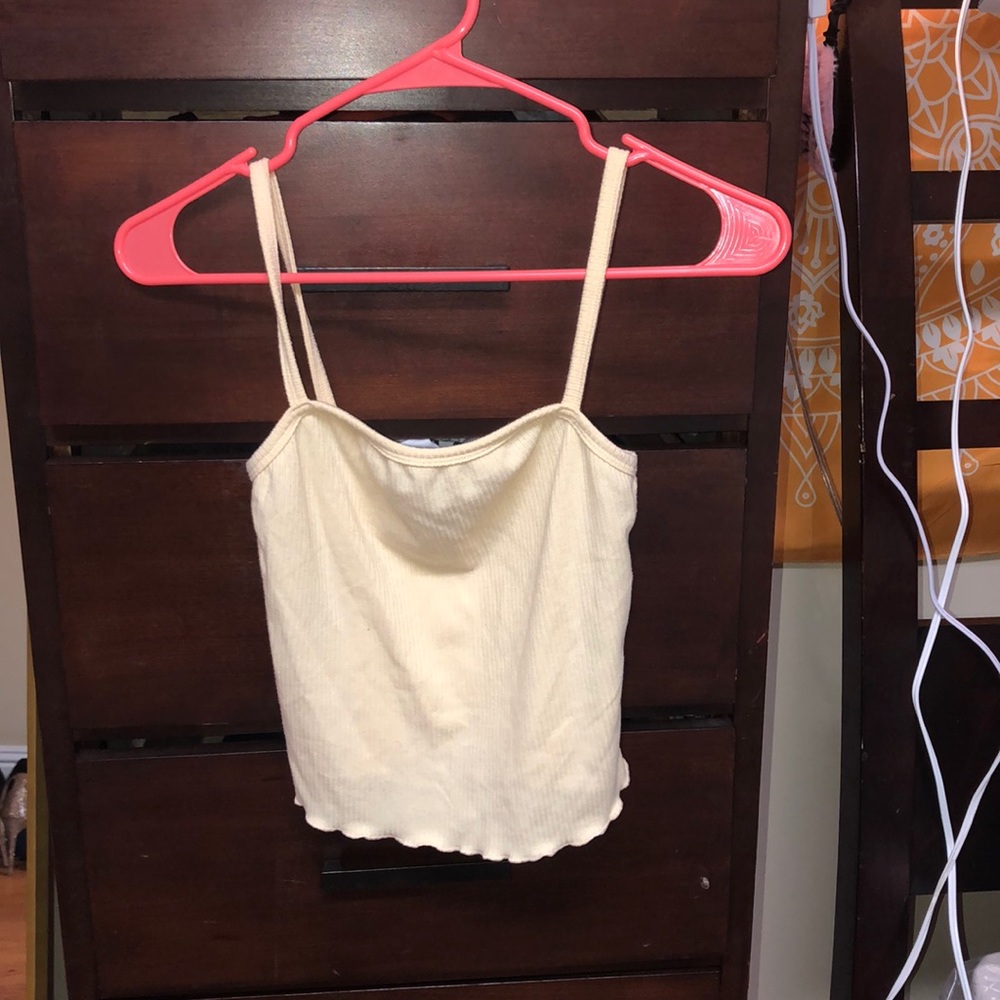 yellow crop top.